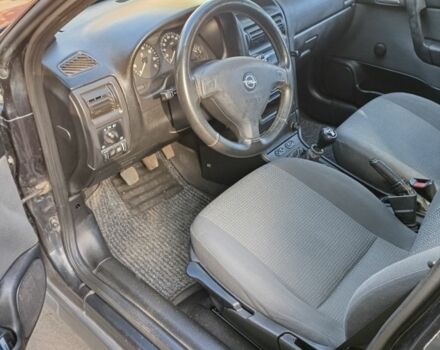 Черный Опель Астра, объемом двигателя 1.4 л и пробегом 136 тыс. км за 3900 $, фото 8 на Automoto.ua