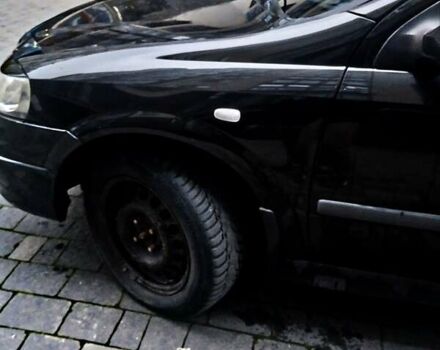 Черный Опель Астра, объемом двигателя 1.39 л и пробегом 214 тыс. км за 1800 $, фото 11 на Automoto.ua