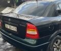 Черный Опель Астра, объемом двигателя 1.4 л и пробегом 380 тыс. км за 3200 $, фото 2 на Automoto.ua