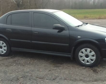 Черный Опель Астра, объемом двигателя 1.4 л и пробегом 351 тыс. км за 3333 $, фото 7 на Automoto.ua