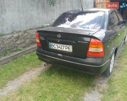 Черный Опель Астра, объемом двигателя 1.4 л и пробегом 243 тыс. км за 3200 $, фото 6 на Automoto.ua