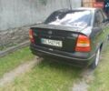 Черный Опель Астра, объемом двигателя 1.4 л и пробегом 243 тыс. км за 3200 $, фото 6 на Automoto.ua