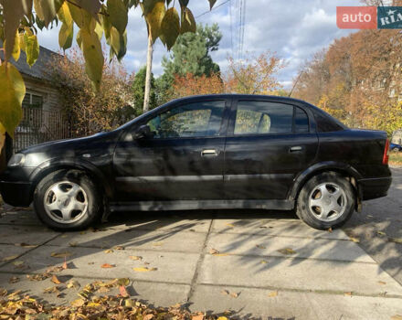Черный Опель Астра, объемом двигателя 1.4 л и пробегом 216 тыс. км за 3500 $, фото 1 на Automoto.ua