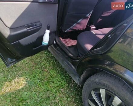 Черный Опель Астра, объемом двигателя 1.4 л и пробегом 250 тыс. км за 3000 $, фото 6 на Automoto.ua