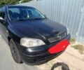 Черный Опель Астра, объемом двигателя 1.4 л и пробегом 244 тыс. км за 2305 $, фото 1 на Automoto.ua