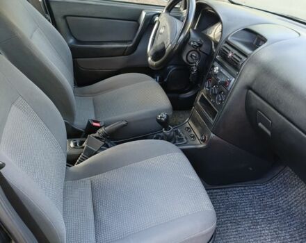 Черный Опель Астра, объемом двигателя 1.4 л и пробегом 136 тыс. км за 3900 $, фото 7 на Automoto.ua