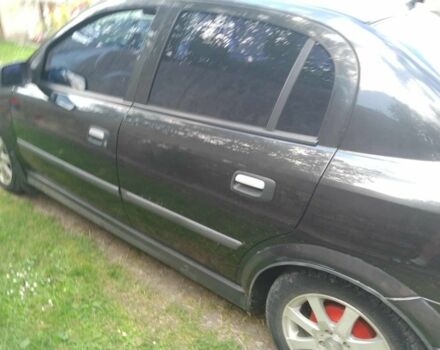 Черный Опель Астра, объемом двигателя 1.4 л и пробегом 243 тыс. км за 3200 $, фото 6 на Automoto.ua