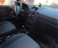 Черный Опель Астра, объемом двигателя 1.4 л и пробегом 230 тыс. км за 3100 $, фото 2 на Automoto.ua