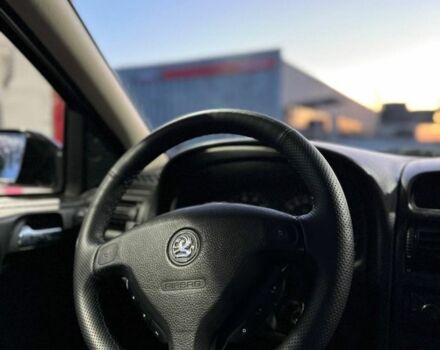 Черный Опель Астра, объемом двигателя 1.4 л и пробегом 215 тыс. км за 3500 $, фото 10 на Automoto.ua