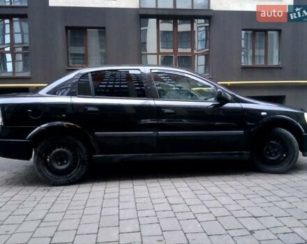 Черный Опель Астра, объемом двигателя 1.39 л и пробегом 214 тыс. км за 1800 $, фото 17 на Automoto.ua