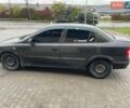 Черный Опель Астра, объемом двигателя 1.36 л и пробегом 215 тыс. км за 2750 $, фото 4 на Automoto.ua