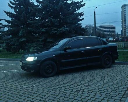Черный Опель Астра, объемом двигателя 1.39 л и пробегом 214 тыс. км за 1800 $, фото 4 на Automoto.ua