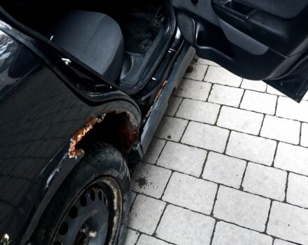 Черный Опель Астра, объемом двигателя 1.4 л и пробегом 214 тыс. км за 1800 $, фото 7 на Automoto.ua