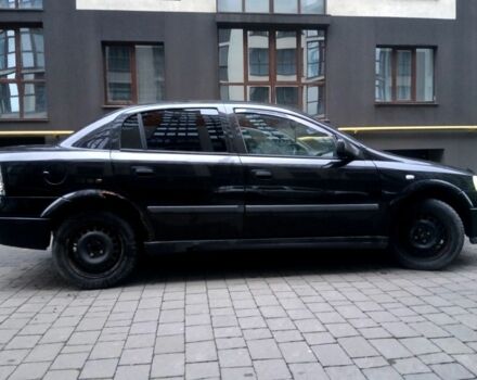 Черный Опель Астра, объемом двигателя 1.4 л и пробегом 214 тыс. км за 1800 $, фото 11 на Automoto.ua