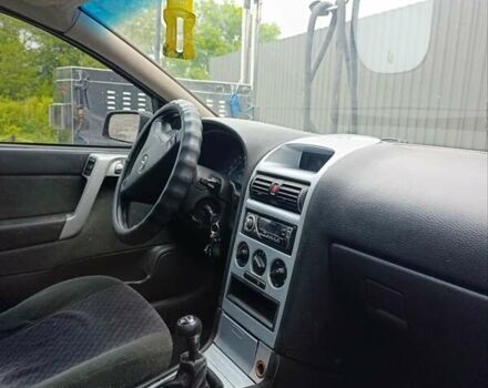 Черный Опель Астра, объемом двигателя 1.6 л и пробегом 147 тыс. км за 2700 $, фото 1 на Automoto.ua