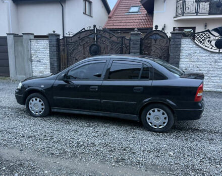 Черный Опель Астра, объемом двигателя 1.36 л и пробегом 260 тыс. км за 2900 $, фото 1 на Automoto.ua