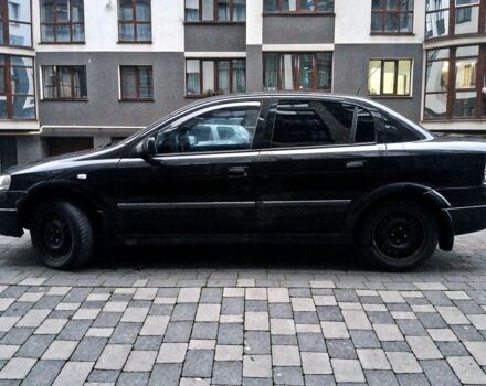 Черный Опель Астра, объемом двигателя 1.4 л и пробегом 214 тыс. км за 1800 $, фото 12 на Automoto.ua