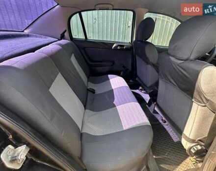 Черный Опель Астра, объемом двигателя 1.4 л и пробегом 310 тыс. км за 3100 $, фото 7 на Automoto.ua