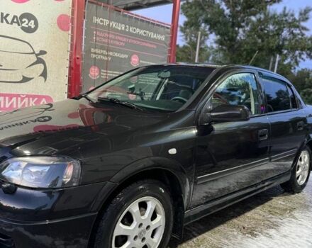 Черный Опель Астра, объемом двигателя 1.4 л и пробегом 215 тыс. км за 3500 $, фото 1 на Automoto.ua