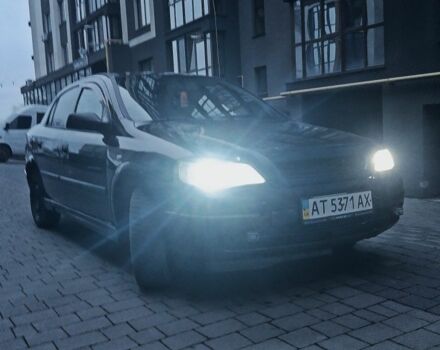 Черный Опель Астра, объемом двигателя 1.4 л и пробегом 214 тыс. км за 1800 $, фото 1 на Automoto.ua