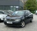 Черный Опель Астра, объемом двигателя 1.4 л и пробегом 164 тыс. км за 3800 $, фото 1 на Automoto.ua