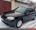 Черный Опель Астра, объемом двигателя 1.4 л и пробегом 26000 тыс. км за 3800 $, фото 1 на Automoto.ua