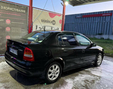 Черный Опель Астра, объемом двигателя 1.36 л и пробегом 215 тыс. км за 3900 $, фото 7 на Automoto.ua