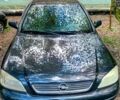 Черный Опель Астра, объемом двигателя 1.4 л и пробегом 400 тыс. км за 4000 $, фото 1 на Automoto.ua
