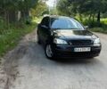 Чорний Опель Астра, об'ємом двигуна 1.4 л та пробігом 220 тис. км за 2300 $, фото 1 на Automoto.ua
