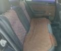Черный Опель Астра, объемом двигателя 1.36 л и пробегом 330 тыс. км за 3600 $, фото 7 на Automoto.ua