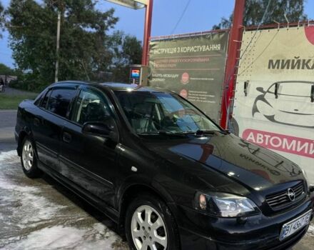 Черный Опель Астра, объемом двигателя 1.4 л и пробегом 215 тыс. км за 3500 $, фото 2 на Automoto.ua