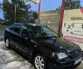Черный Опель Астра, объемом двигателя 1.4 л и пробегом 215 тыс. км за 3500 $, фото 2 на Automoto.ua