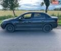 Черный Опель Астра, объемом двигателя 1.4 л и пробегом 294 тыс. км за 3600 $, фото 1 на Automoto.ua