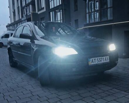 Черный Опель Астра, объемом двигателя 1.39 л и пробегом 214 тыс. км за 1800 $, фото 1 на Automoto.ua