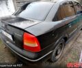 Черный Опель Астра, объемом двигателя 1.4 л и пробегом 210 тыс. км за 3700 $, фото 3 на Automoto.ua