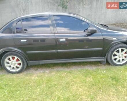 Черный Опель Астра, объемом двигателя 1.4 л и пробегом 243 тыс. км за 3200 $, фото 10 на Automoto.ua