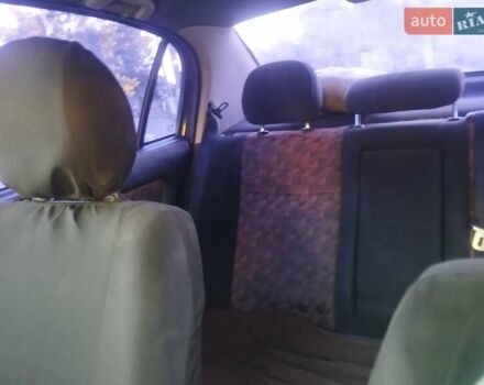 Черный Опель Астра, объемом двигателя 1.36 л и пробегом 330 тыс. км за 3600 $, фото 2 на Automoto.ua