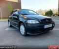 Черный Опель Астра, объемом двигателя 1.4 л и пробегом 270 тыс. км за 1750 $, фото 1 на Automoto.ua