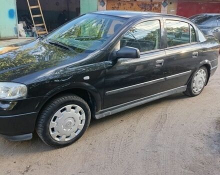 Черный Опель Астра, объемом двигателя 1.4 л и пробегом 136 тыс. км за 3900 $, фото 1 на Automoto.ua