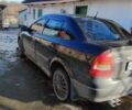 Черный Опель Астра, объемом двигателя 1.4 л и пробегом 230 тыс. км за 3100 $, фото 4 на Automoto.ua