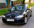 Черный Опель Астра, объемом двигателя 1.4 л и пробегом 203 тыс. км за 1900 $, фото 1 на Automoto.ua