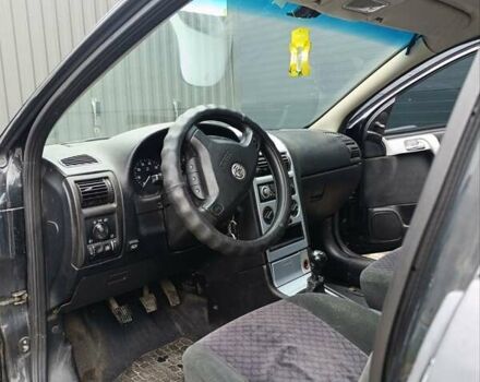 Черный Опель Астра, объемом двигателя 1.6 л и пробегом 147 тыс. км за 2700 $, фото 16 на Automoto.ua