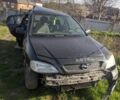 Черный Опель Астра, объемом двигателя 1 л и пробегом 290 тыс. км за 400 $, фото 1 на Automoto.ua
