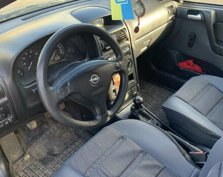 Черный Опель Астра, объемом двигателя 1.4 л и пробегом 216 тыс. км за 3500 $, фото 4 на Automoto.ua