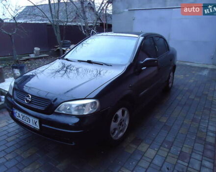 Черный Опель Астра, объемом двигателя 2 л и пробегом 300 тыс. км за 3500 $, фото 1 на Automoto.ua