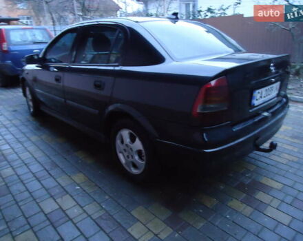 Черный Опель Астра, объемом двигателя 2 л и пробегом 300 тыс. км за 3500 $, фото 3 на Automoto.ua