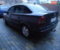 Черный Опель Астра, объемом двигателя 2 л и пробегом 300 тыс. км за 3500 $, фото 3 на Automoto.ua