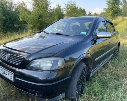 Черный Опель Астра, объемом двигателя 1.4 л и пробегом 294 тыс. км за 3800 $, фото 3 на Automoto.ua