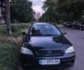 Черный Опель Астра, объемом двигателя 1.4 л и пробегом 303 тыс. км за 3693 $, фото 1 на Automoto.ua