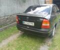 Черный Опель Астра, объемом двигателя 1.4 л и пробегом 243 тыс. км за 3200 $, фото 7 на Automoto.ua